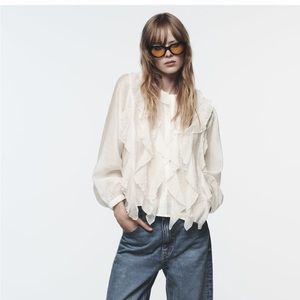 ZARA’S WHITE RUFFLED BLOUSE